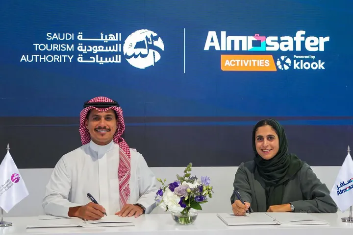 Representatives of the Saudi Tourism Authority and Almosafer Activities sign a tourism distribution partnership