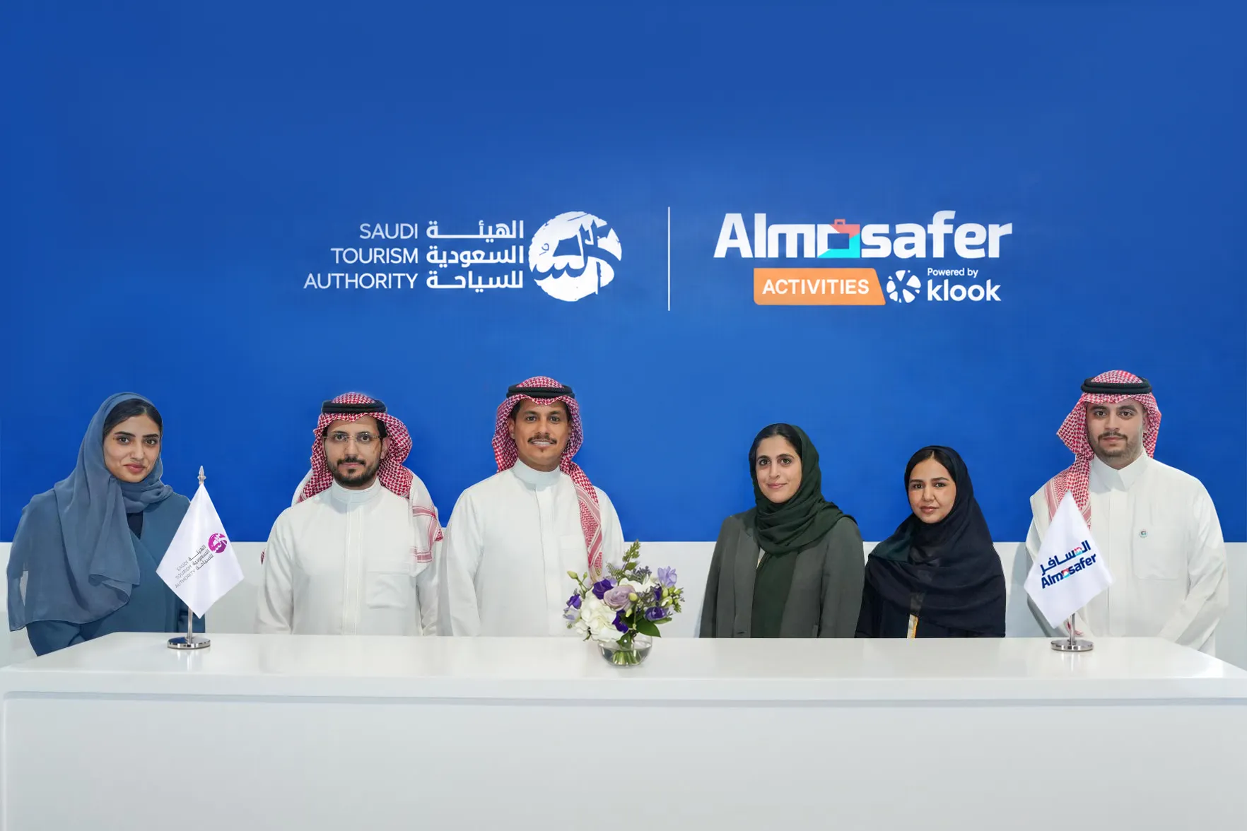 Representatives from the Saudi Tourism Authority and Almosafer Activities gathered after announcing their distribution partnership