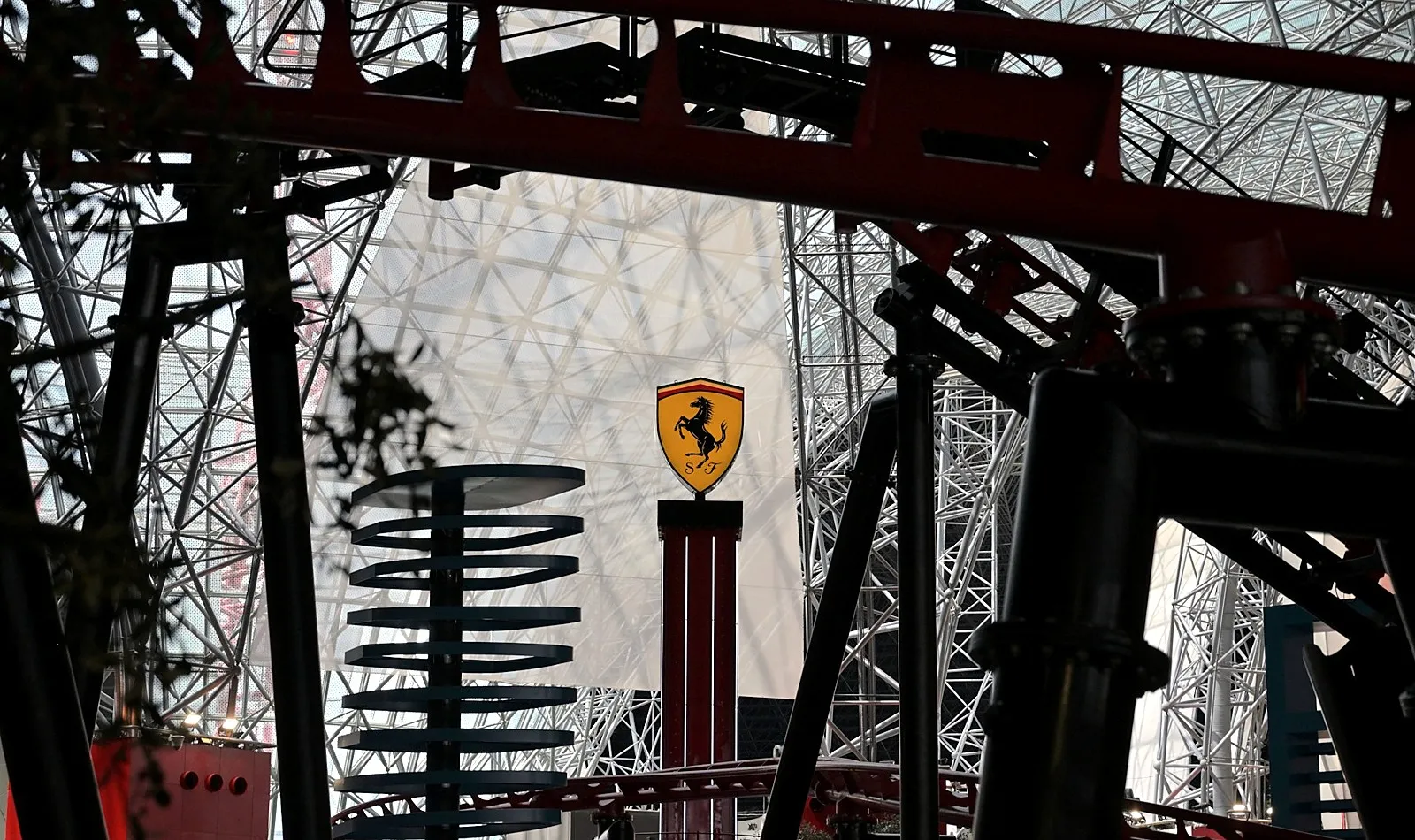 Ferrari World interior with its roof structure and Ferrari emblem
